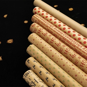 Assorted vintage kraft Christmas wrapping paper rolls with festive holiday patterns