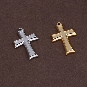 Polished stainless steel cross and angel pendants in gold and silver finishes