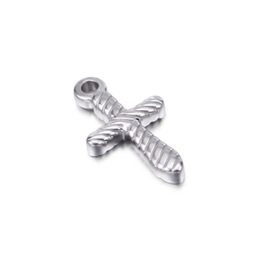 Retro titanium steel cross pendant necklace with textured surface on a white background