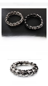 Detail showing vintage dragon scale texture on punk stainless steel bracelet with dimensions
