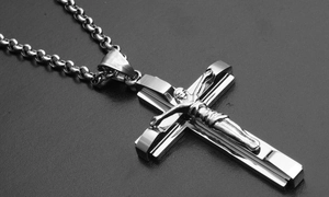 Detailed close-up of a silver stainless steel crucifix pendant necklace for men and women
