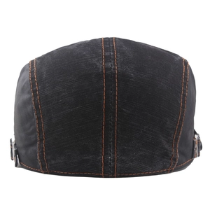 Black denim flat cap with orange contrast stitching and metal buckle back view