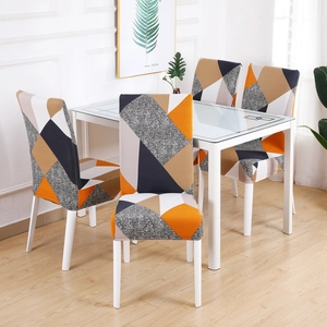 Elastic chair covers set with modern geometric patchwork pattern in orange and grey
