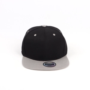 Detail of a black and grey snapback hat featuring a flat brim and laser sticker