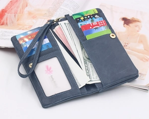 Detail view of the deep blue frosted leather wallet interior with multiple card slots