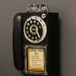 Vintage industrial wall-mounted resin telephone model with silver dial and detailed 1957 lettering