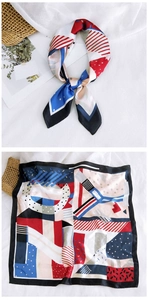 Detail of silk square scarf featuring bold geometric patterns and smooth satin texture