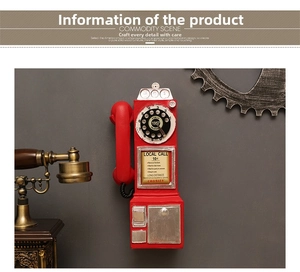 Close-up of red 1957 vintage resin rotary wall phone decor with industrial wall background