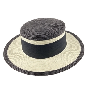 Flat top straw boater hat in black and cream contrast with wide ribbon band