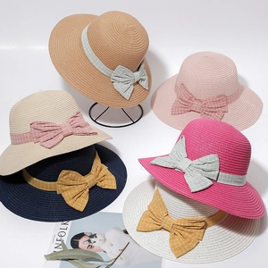 Women's summer straw sun hats with checkered bows in various colors for UV protection