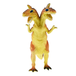 Detailansicht der gelben zweiköpfigen Drachenfigur mit orangefarbenen Akzenten und Zähnen