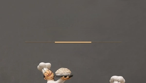 Detailed close-up of retro American resin chef figurine with high-quality artistic finish