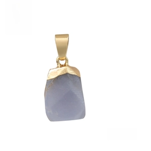 Close-up of raw blue chalcedony stone pendant with polished gold metal bail on white back