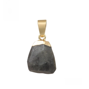Detailed macro view of natural labradorite raw stone pendant with a golden metal clasp