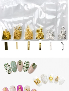 Detail of gold and silver metal nail art studs and rivets with manicure application view