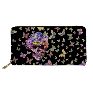 Detail of zip-around long wallet featuring vibrant skull and floral butterfly pattern
