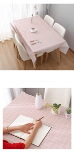Detailed close-up of pink and white checkered PEVA tablecloth with waterproof texture