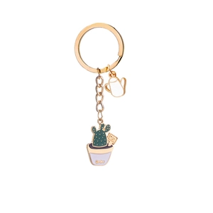 Detail of zinc alloy cactus succulent keychain with white watering can charm pendant