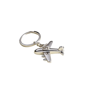 Silver metal J-20 fighter jet keychain with a polished finish on a white background