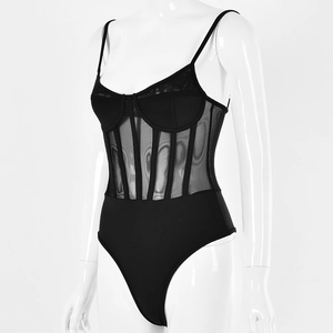Detail of black corset bodysuit featuring mesh panels and structured cups on a mannequin