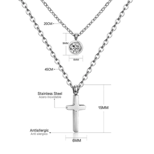 Detailed view of silver double-layer stainless steel necklace with cross and zircon pendants