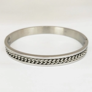 Mens silver stainless steel chain link bracelet with polished finish on white background