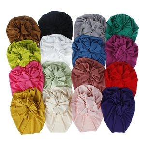 Vibrant collection of soft cotton baby turban hats featuring large pleated floral details