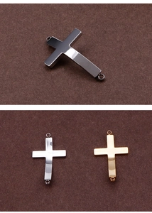 Three colors of stainless steel cross charms with dual connector rings for jewelry making
