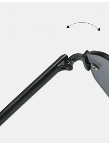 Detail of durable metal hinges on retro polygonal sunglasses for women