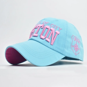 Close-up of 3D pink Boston embroidery on light blue twill cotton baseball cap