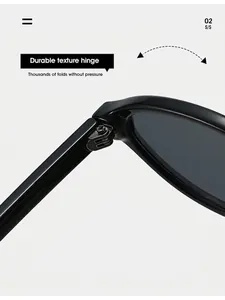 Détail de la charnière en métal sur lunettes de soleil ovales noires de qualité