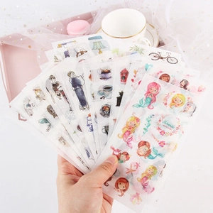 Close-up of transparent washi stickers featuring mermaid and lifestyle illustrations