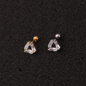 Macro shot of triangle screw-back earrings with clear cubic zirconia in gold and silver