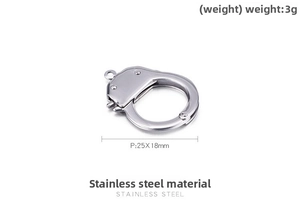 Macro detail of 25x18mm stainless steel handcuff pendant with 3g weight specification