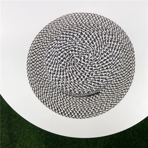 Flat top straw sun hat for women with black and white woven texture and wide brim