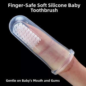 Macro view of clear silicone finger toothbrush for baby gum and tongue cleaning