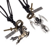 Close-up of retro leather necklaces with bronze horse and silver reaper pendants