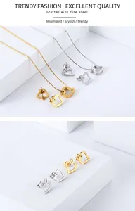 Makro-Detail des herzförmigen Edelstahlschmucksets in Gold- und Silberoptik