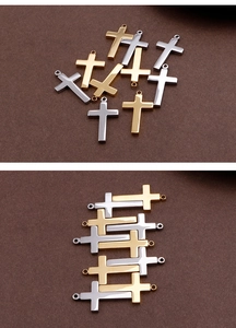Detailed macro view of gold and silver minimalist cross pendants for DIY jewelry making
