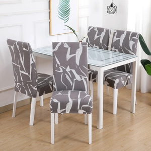 Modern grey and white geometric stretch chair covers for armless dining chairs in home setup