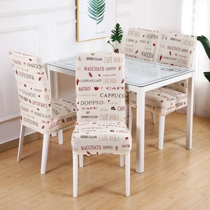 Close-up of beige stretch chair covers with vintage coffee theme typography and patterns