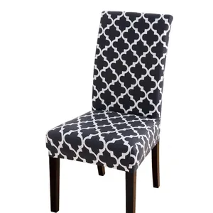 Elastic chair cover with blue Moroccan trellis pattern on a wooden dining chair