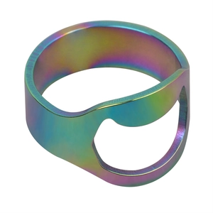 Macro detail of rainbow stainless steel bottle opener ring with brushed metal texture