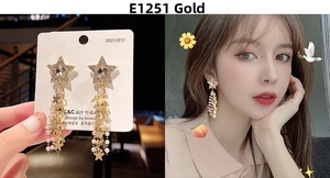 Detail of star-shaped tassel earrings with S925 silver needles and white pearls