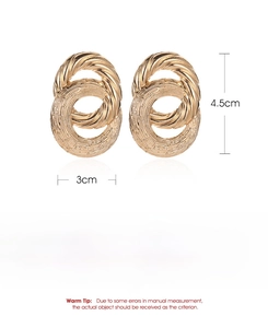 Detailed view of golden textured double hoop earrings with exact size and weight specs