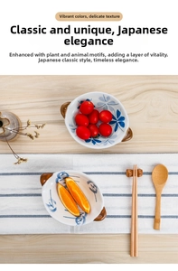 Top-down macro of ceramic sauce bowls with blue floral patterns and double handles