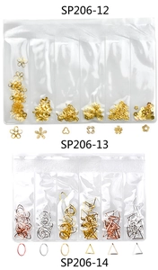 Detailed view of assorted metal nail art studs in gold, silver and rose gold finishes
