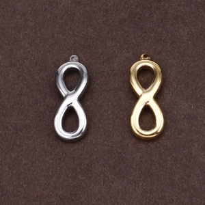 Polished stainless steel infinity symbol pendants in gold and silver finishes