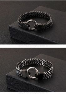 Macro view of dual-layer fox tail titanium steel bracelet with large round clasp