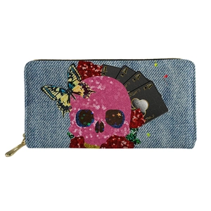 Detail of PU leather wallet featuring pink sequin skull and ace of spades print